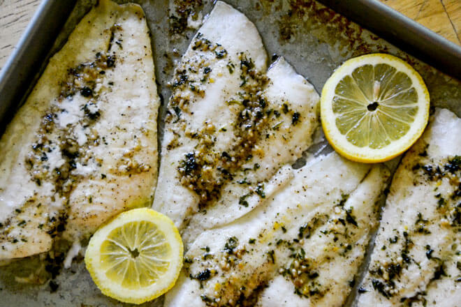 This Easy Baked Fish with Lemon Butter Sauce will have you feeling like a chef from the comfort of your kitchen!