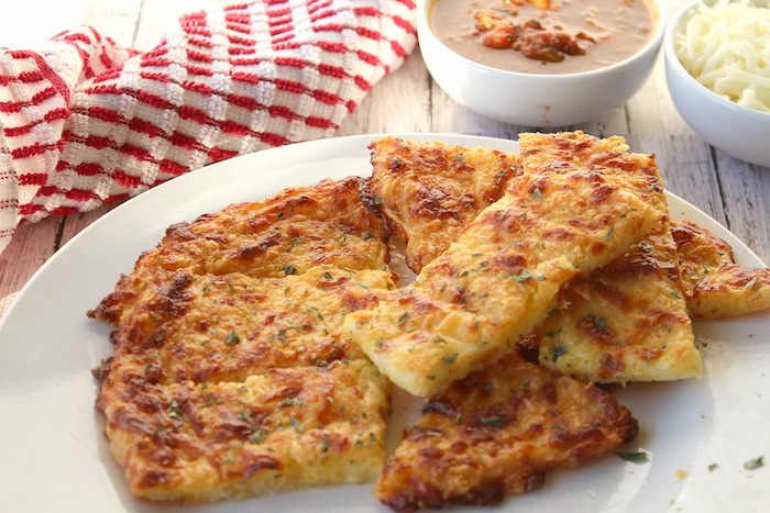 Keeping a keto diet and being able to enjoy garlic bread are both possible with this keto, gluten-free easy cheesy bread recipe.  https://www.intoxicatedonlife.com/?p=97052